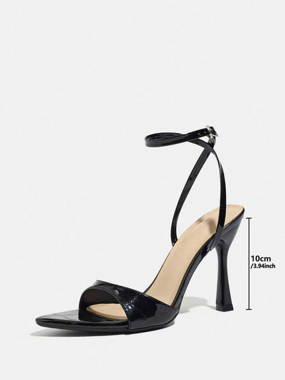 Noir Velisse Patent Cross Stiletto Heels